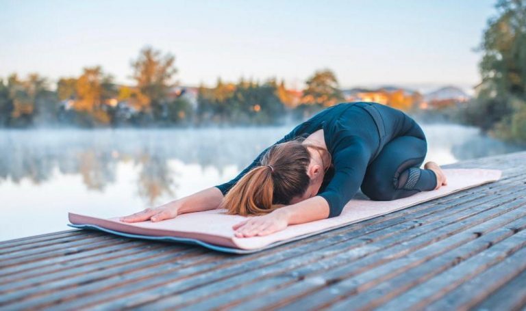 Woman stretching out lower back