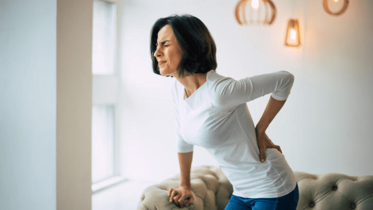 Women with back pain looking for natural pain relief from her local chiropractic clinic