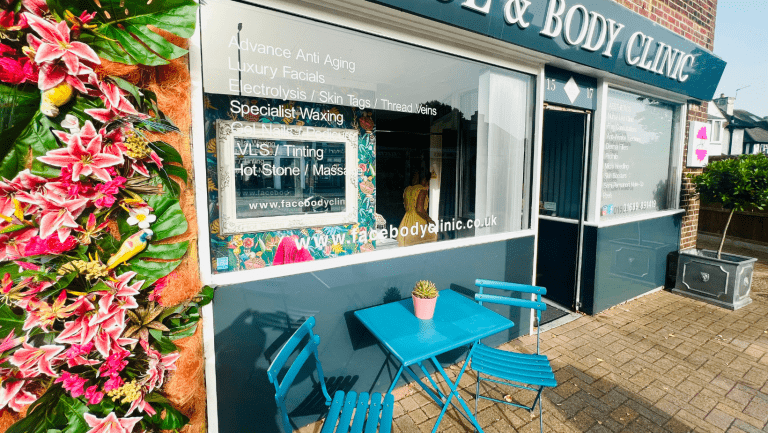 Chiropractic Clinic where a top Orpington chiropractor works, with beautiful flowers and chairs out side welcoming new patients in